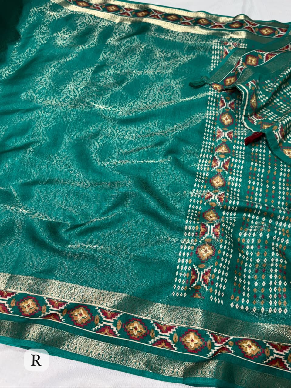 Rama Green color Ajrakh Patola Print Jacquard Border Saree with Unstitched Blouse