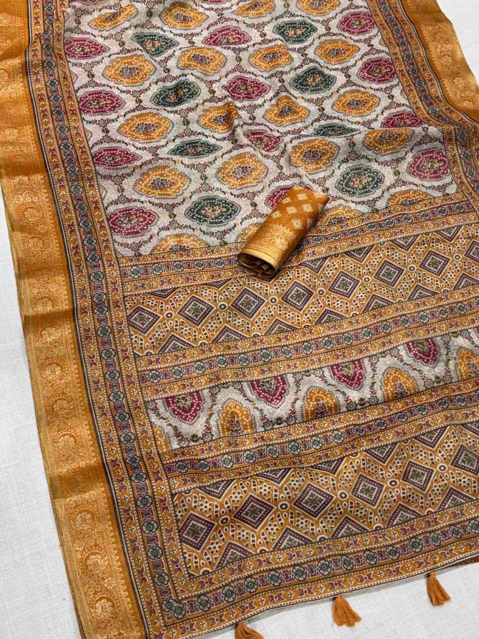 Yellow color Ajrakh Print Saree with Unstitched Blouse