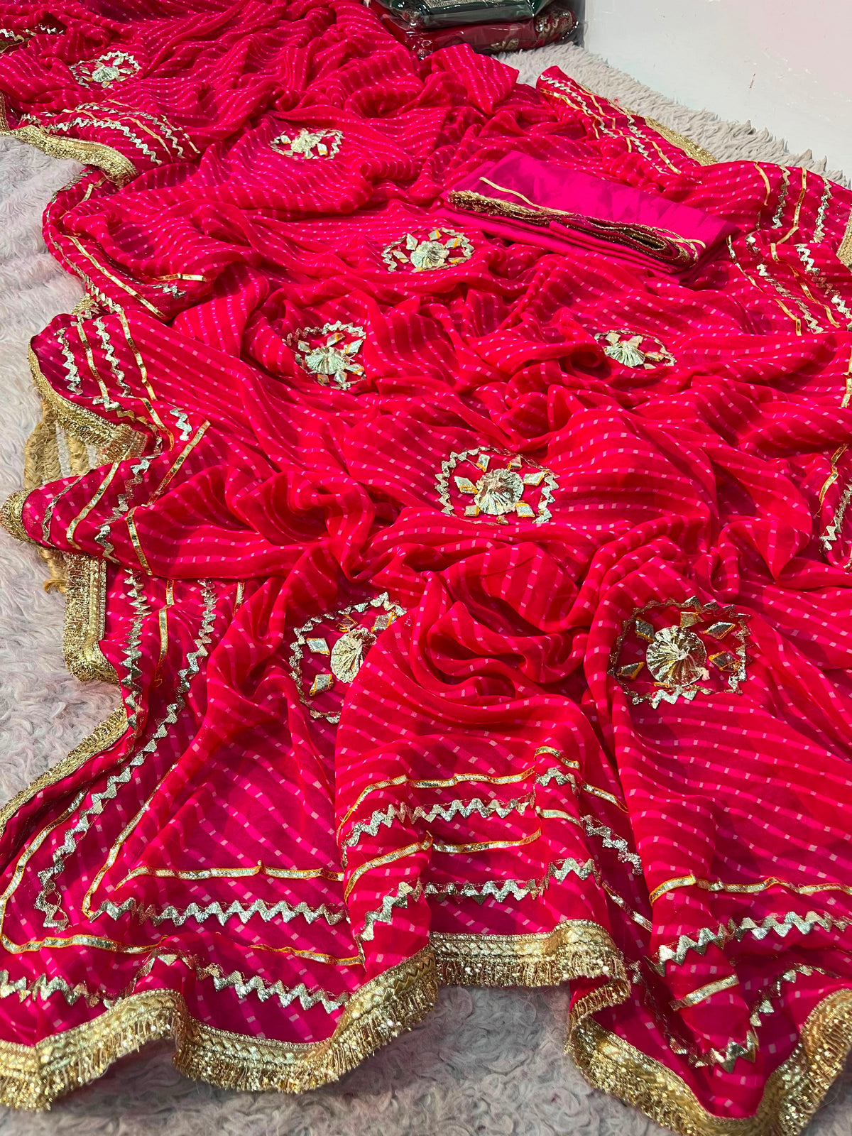 Rani Pink color Saree With Unstitched Blouse