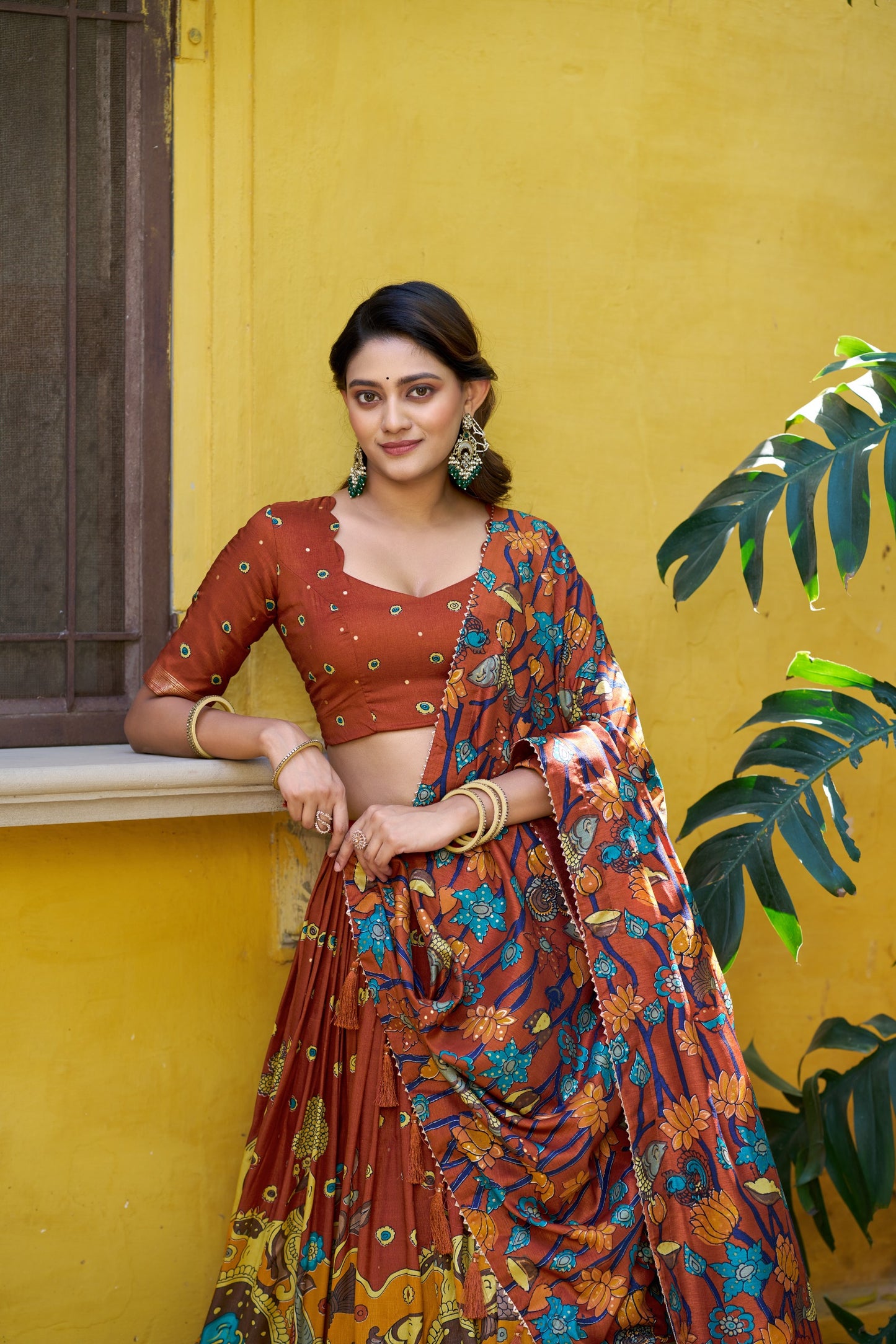 Rust Orange Color Tussar Silk Designer Kalamkari Print Lehenga Choli with Dupatta with a foil work border