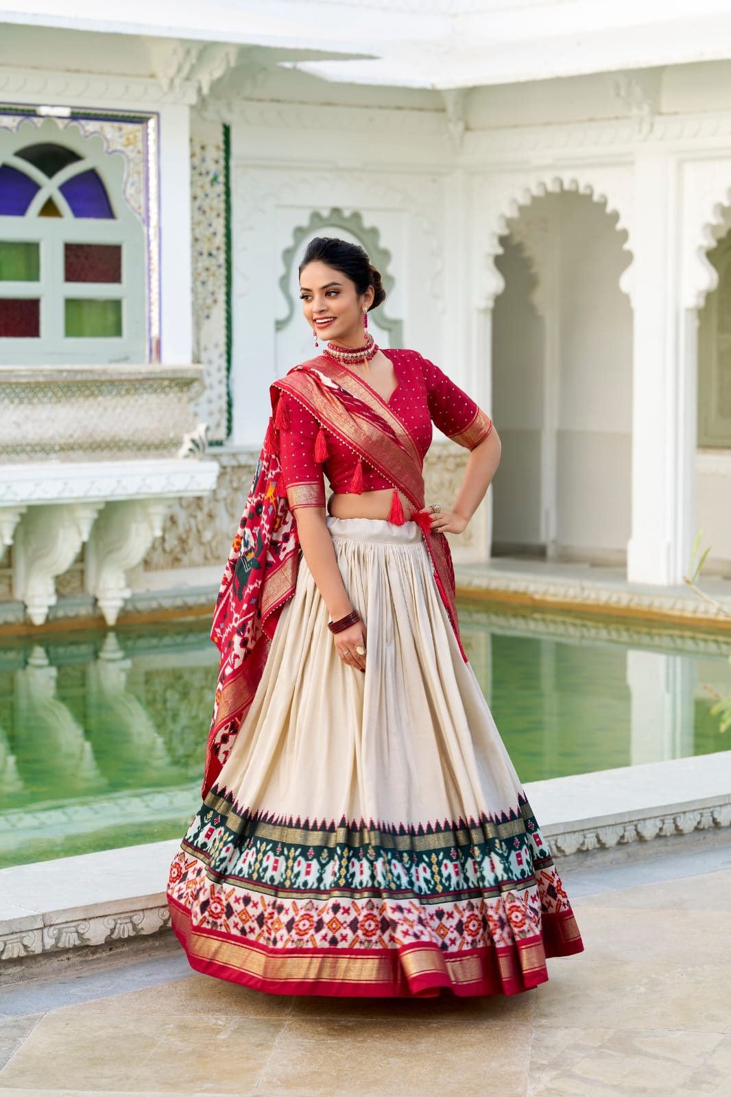 White Color Tussar Silk Patola Print Lehenga Choli with Dupatta With foil work border