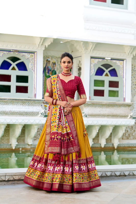 Mustard Yellow Color Tussar Silk Patola Print Lehenga Choli with Dupatta With foil work border