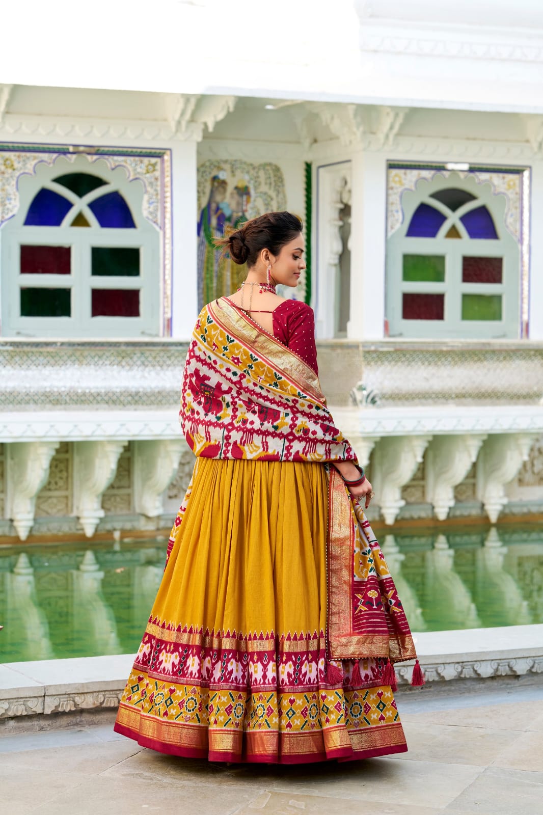 Mustard Yellow Color Tussar Silk Patola Print Lehenga Choli with Dupatta With foil work border