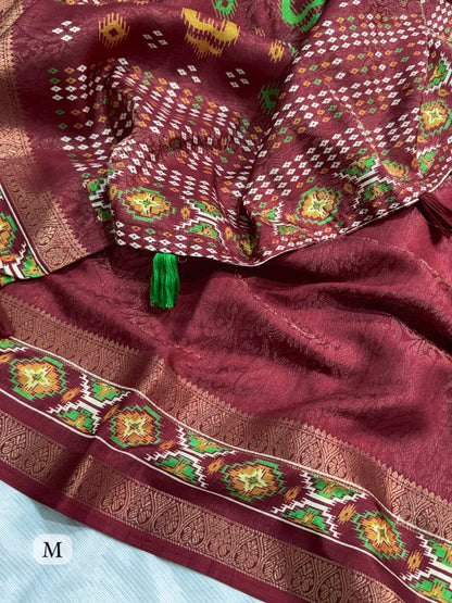 Maroon color Ajrakh Patola Print Jacquard Border Saree with Unstitched Blouse