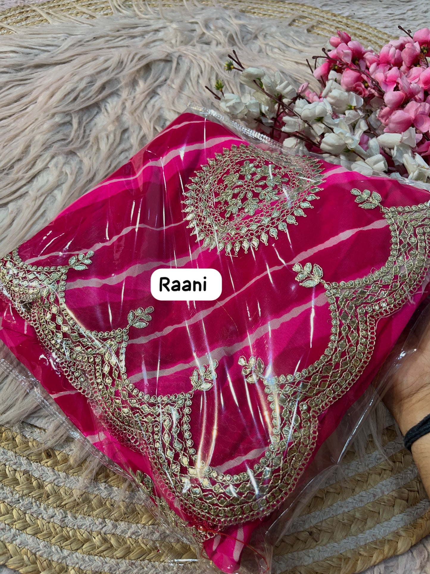 Rani Pink color Lehriya Print Saree with Unstitched Blouse