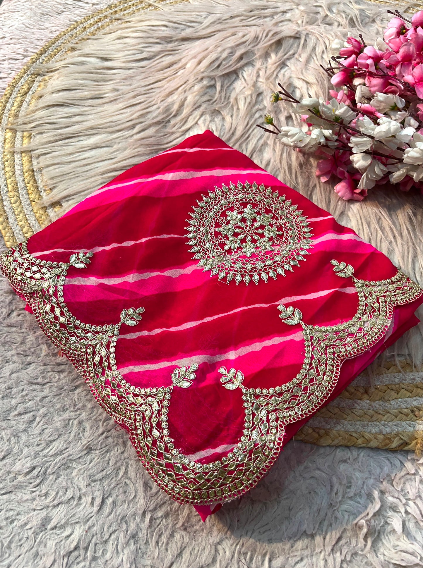 Rani Pink color Lehriya Print Saree with Unstitched Blouse