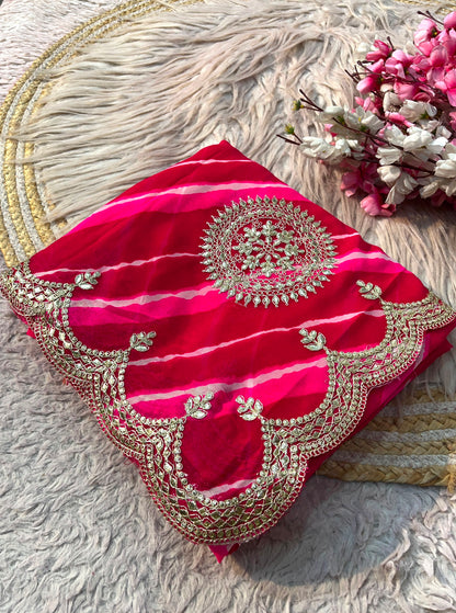 Rani Pink color Lehriya Print Saree with Unstitched Blouse