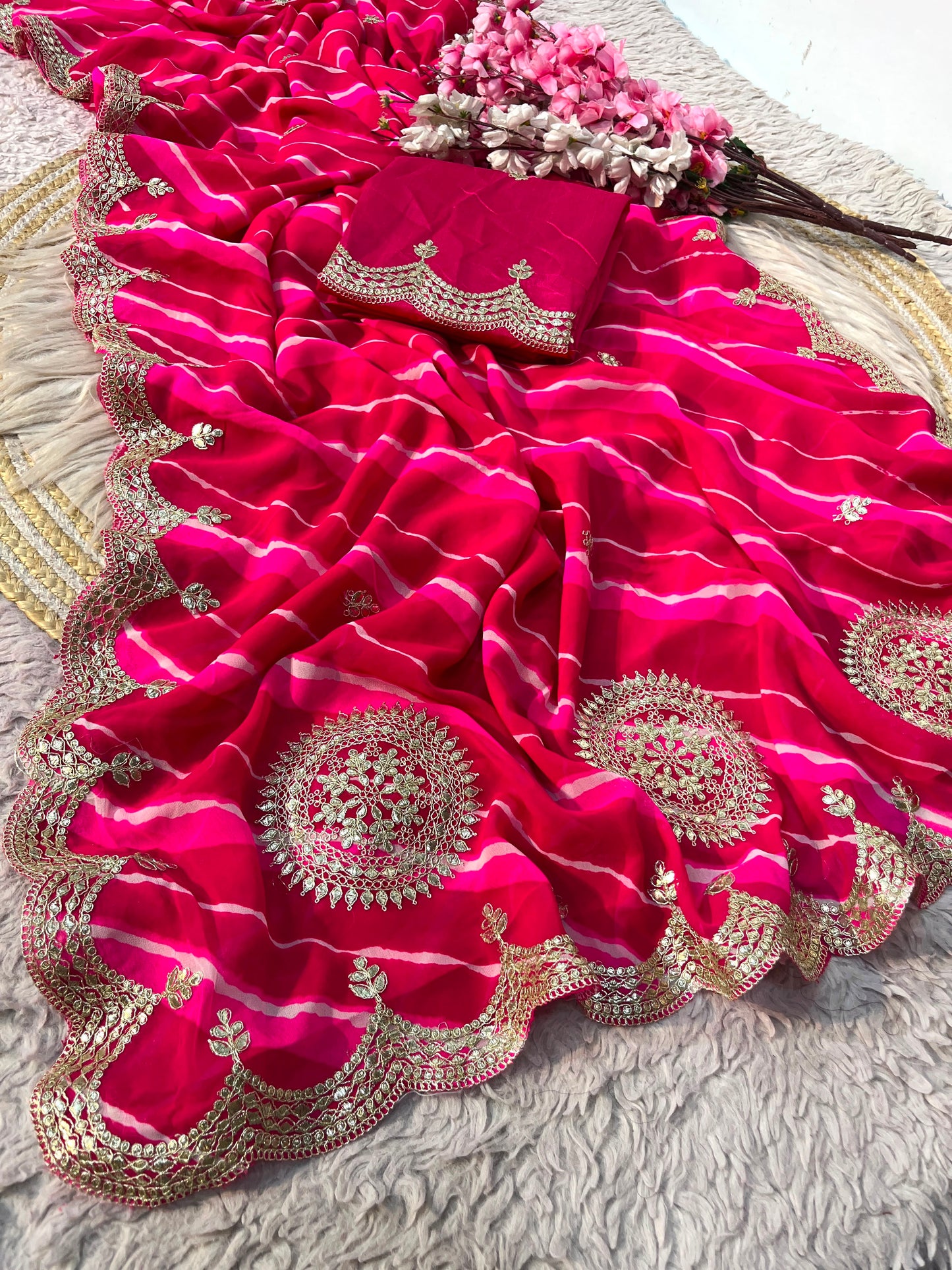 Rani Pink color Lehriya Print Saree with Unstitched Blouse