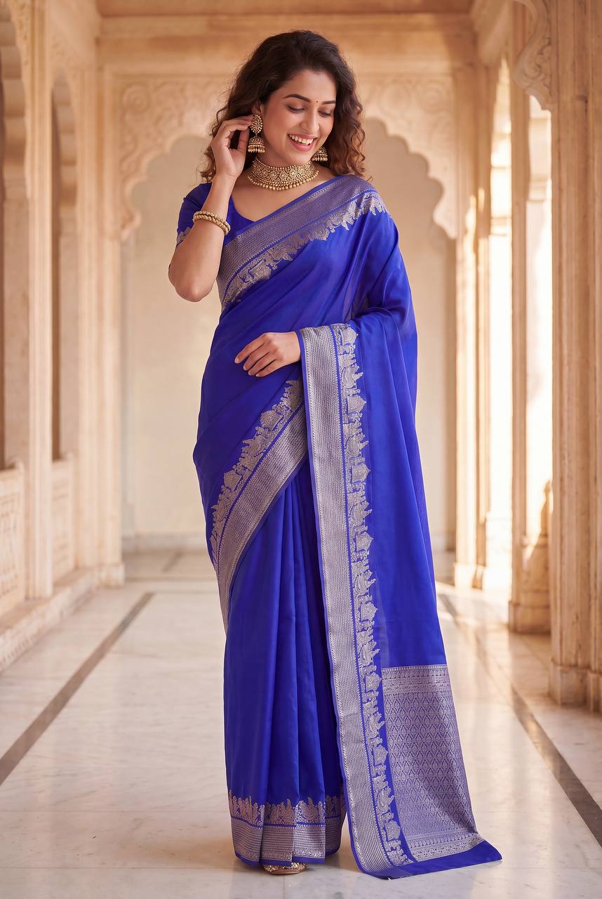 Royal Blue color Lichi Silk Traditional Saree with Unstitched Blouse