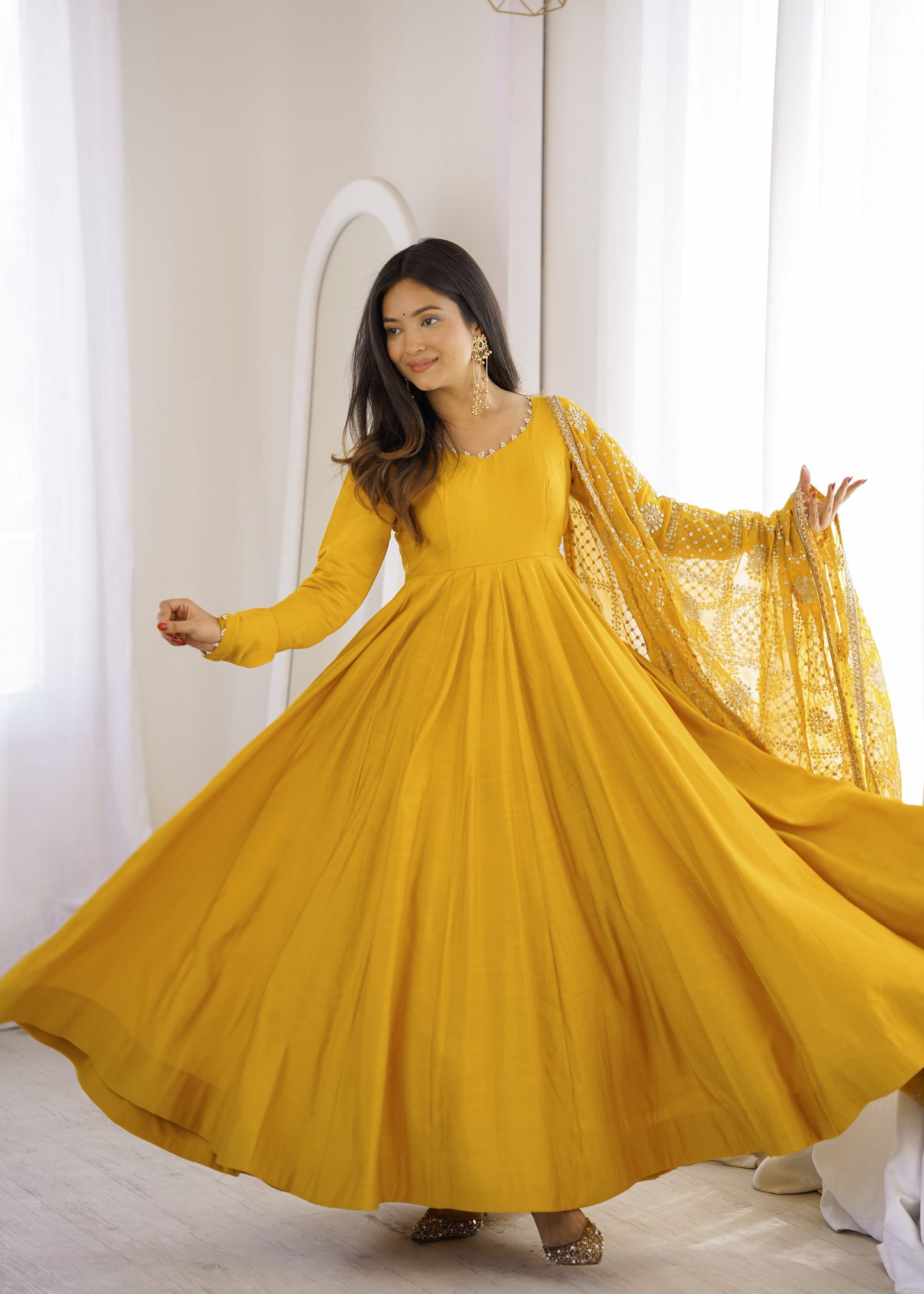 Yellow color Roman Silk Long Anarkali Gown