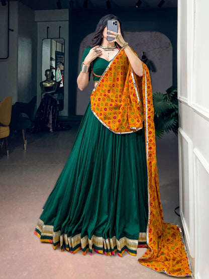 Green color Chinon Navratri Lehenga Choli with Bandhani Print Dupatta