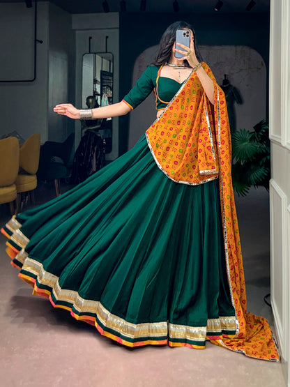 Green color Chinon Navratri Lehenga Choli with Bandhani Print Dupatta