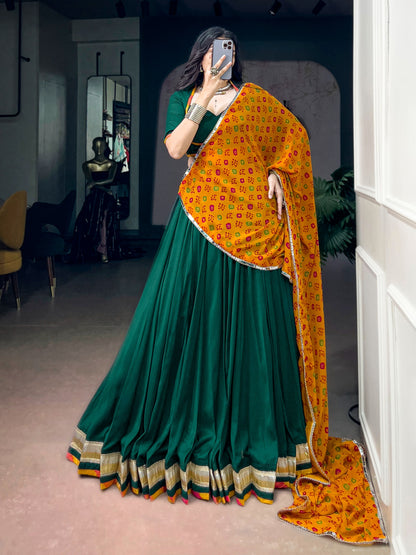 Green color Chinon Navratri Lehenga Choli with Bandhani Print Dupatta