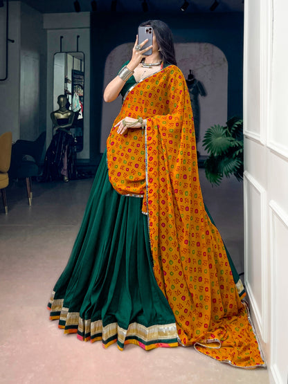 Green color Chinon Navratri Lehenga Choli with Bandhani Print Dupatta