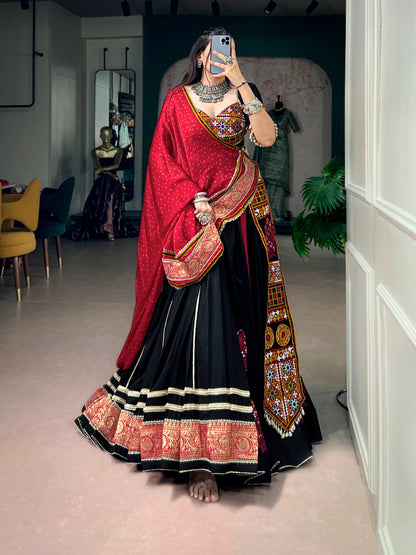 Black color Rayon Kutchi Embroidery Patch Work Navratri Lehenga Choli with Bandhej Print Dupatta