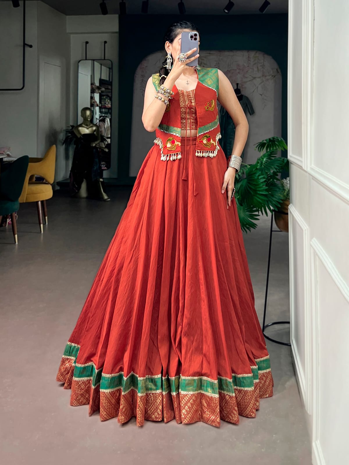 Rust orange color Pure Chanderi Lehenga Choli with Gamthi Kodi work Jacket